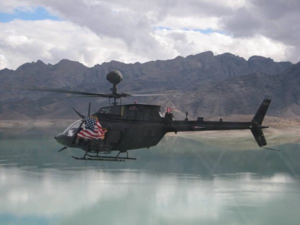 Kiowa displaying american flag